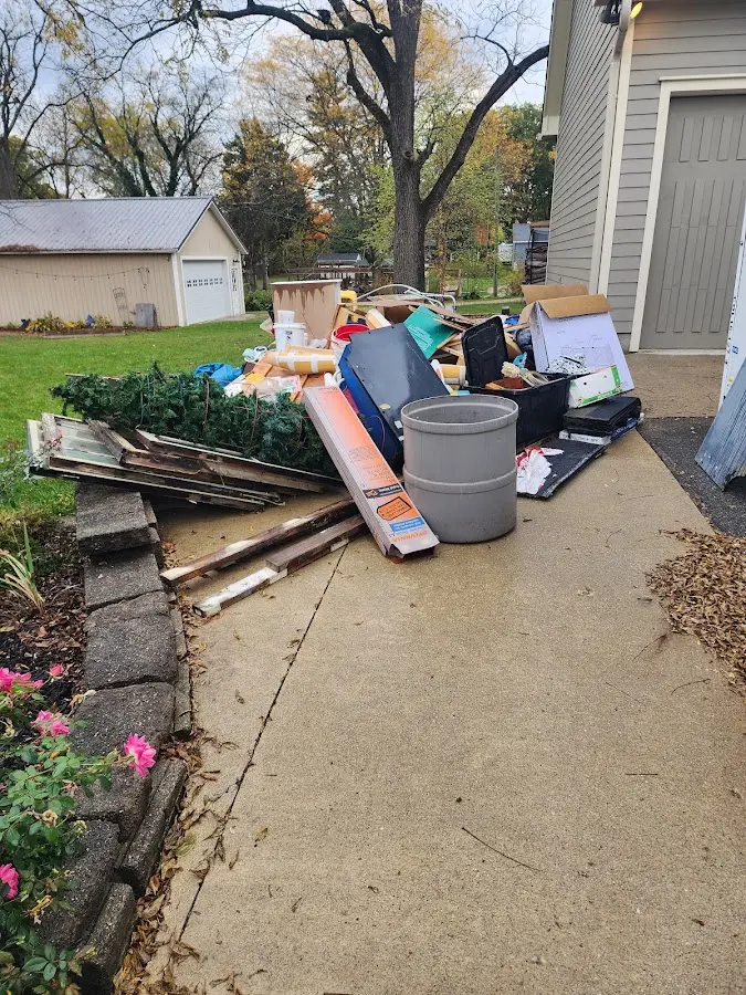 Dumpster being loaded with debris for Commercial Dumpster Rental in Chino Hills